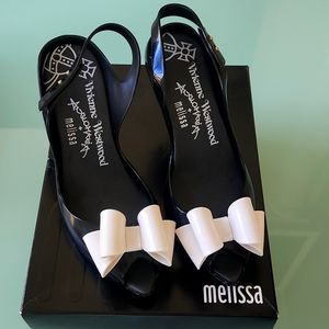 Vivienne Westwood anglomania × Mellissa black white bow pumps .